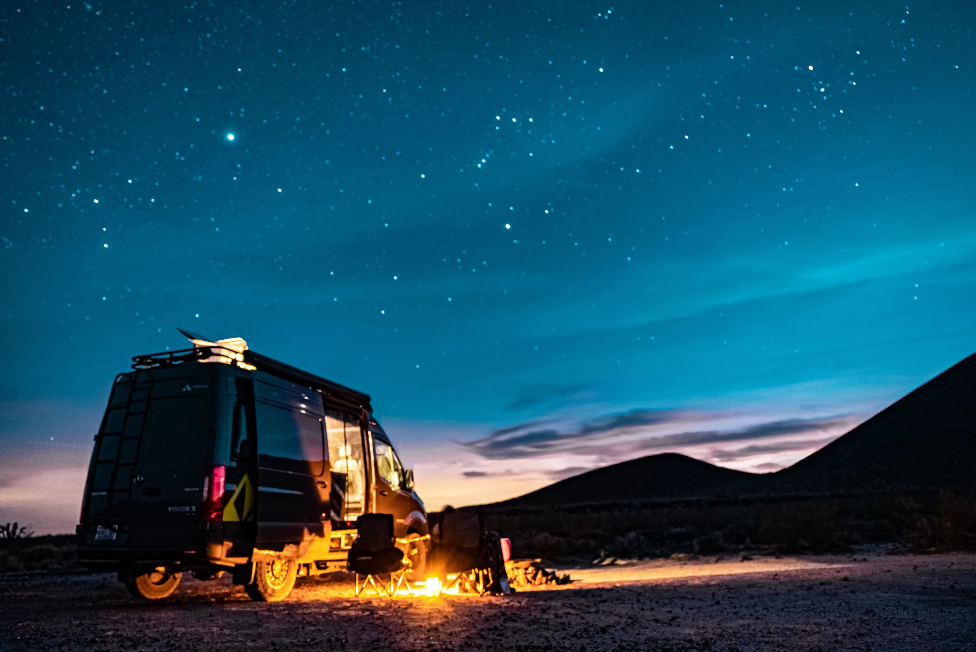 TrueVan campfire at night